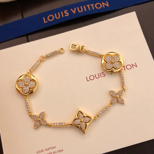 260610 The new bracelet is adorned with numerous diamonds.