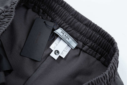 250408 New high-quality metal triangular label characteristic knitted shorts