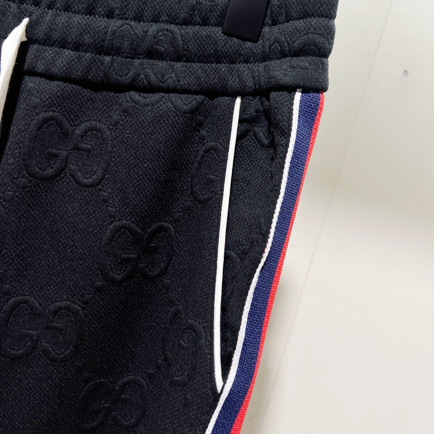 250923 New high-quality dark-patterned jacquard red and blue webbing patchwork sportswear pants