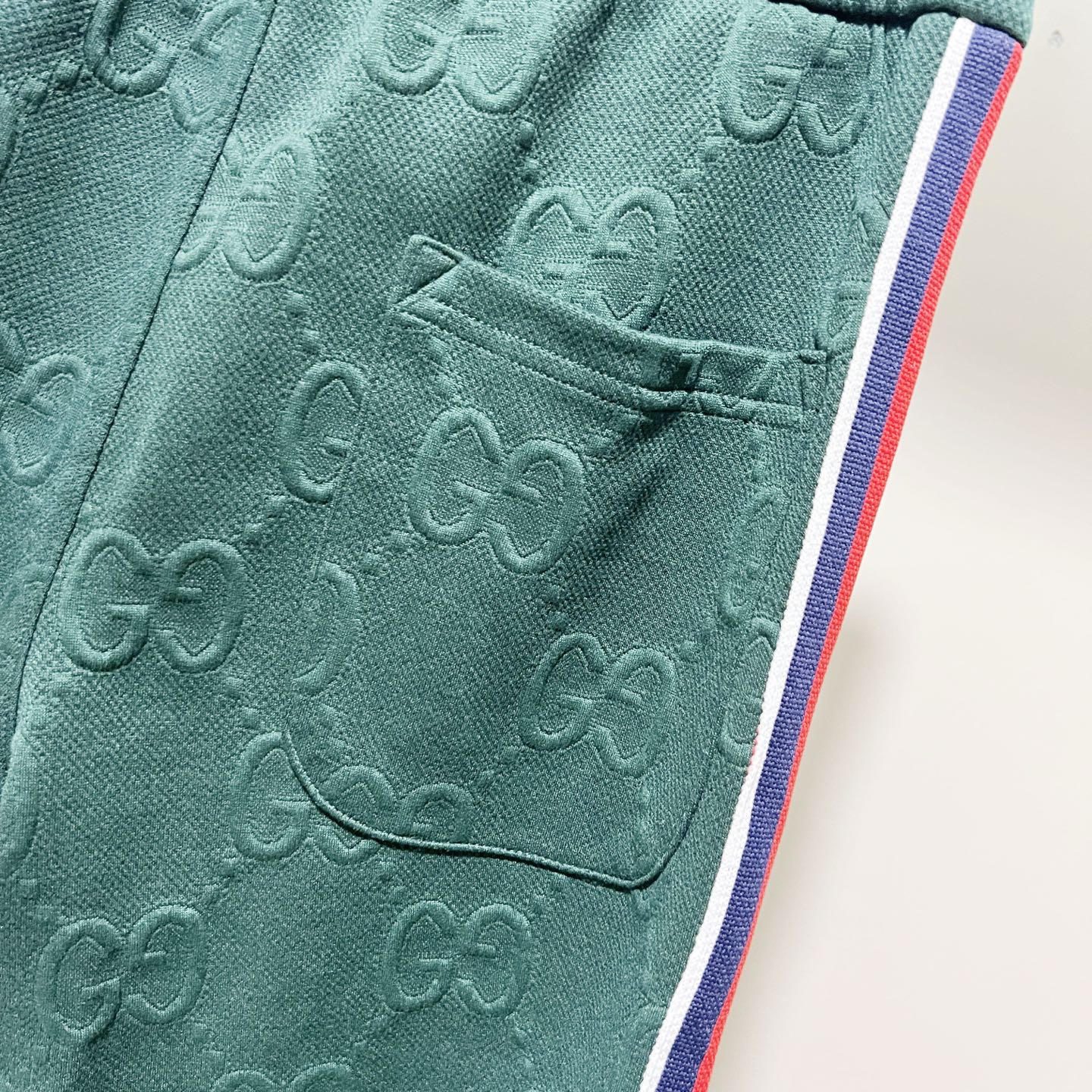 250923 New high-quality dark-patterned jacquard red and blue webbing patchwork sportswear pants