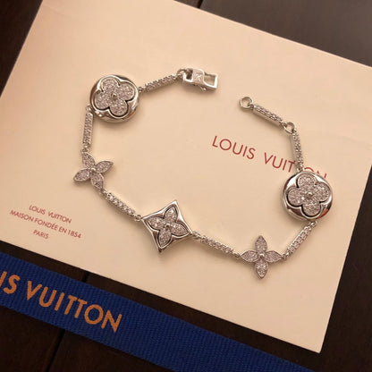 260610 The new bracelet is adorned with numerous diamonds.
