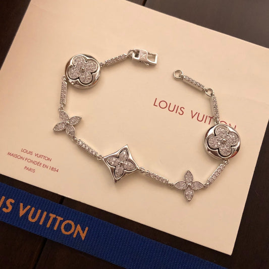 260610 The new bracelet is adorned with numerous diamonds.