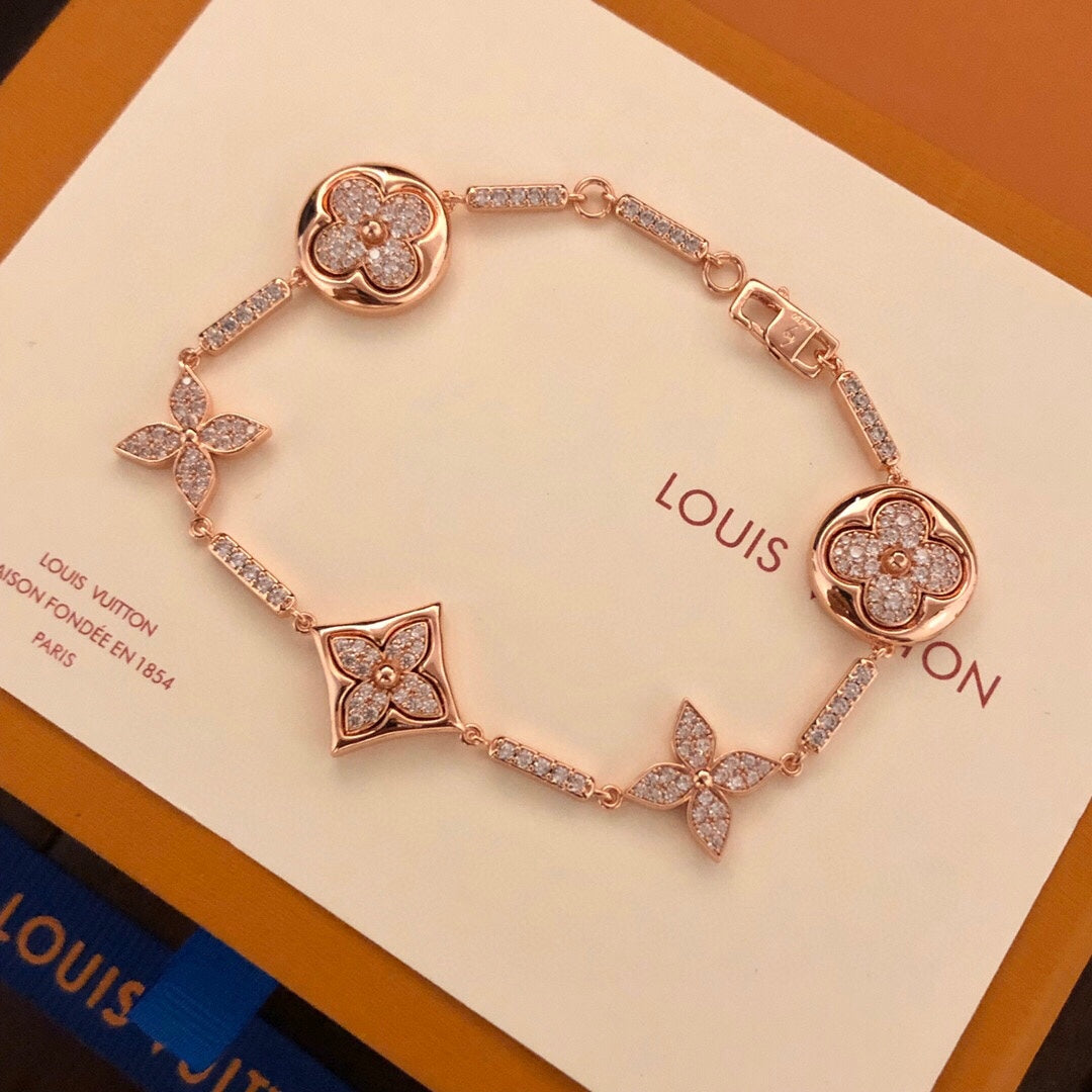 260610 The new bracelet is adorned with numerous diamonds.