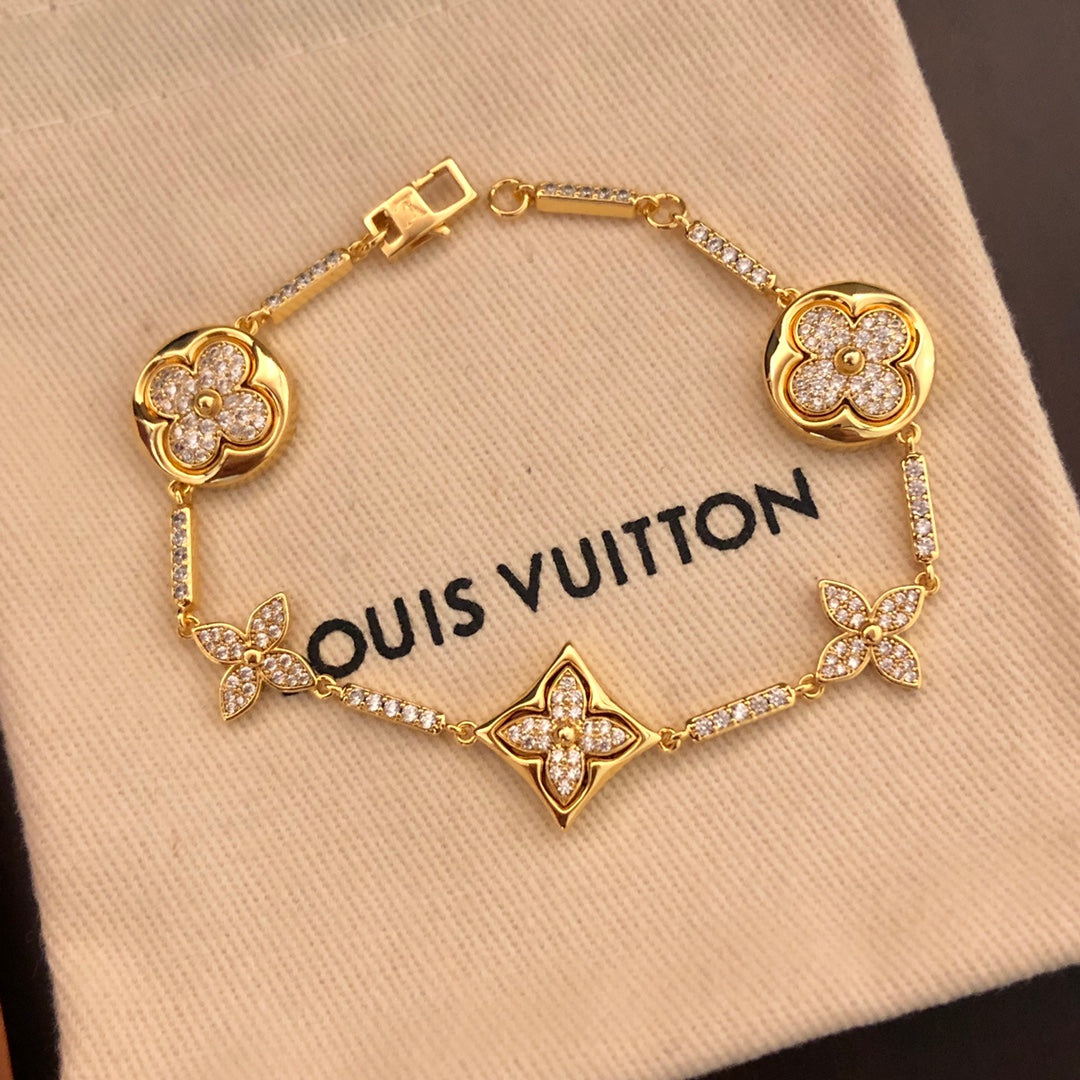 260610 The new bracelet is adorned with numerous diamonds.