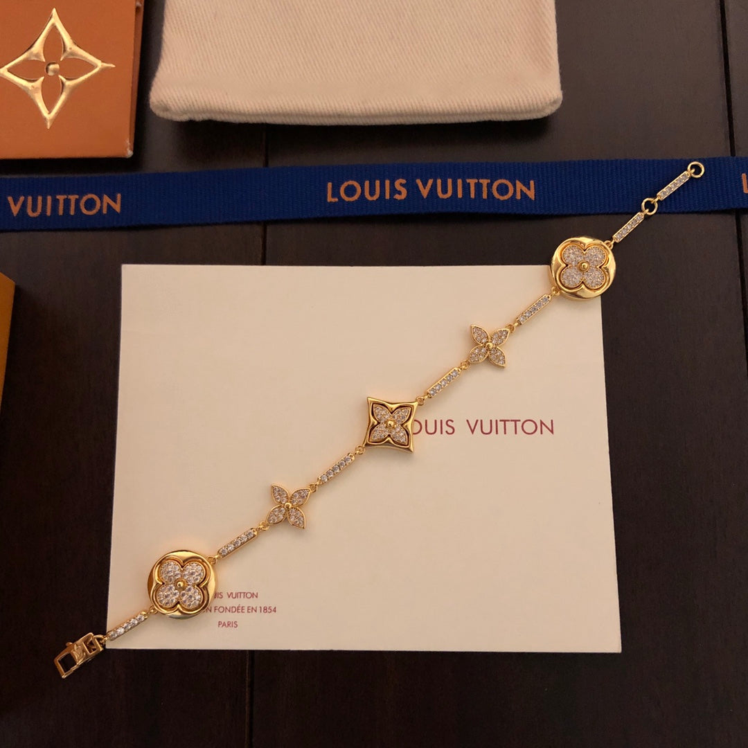 260610 The new bracelet is adorned with numerous diamonds.