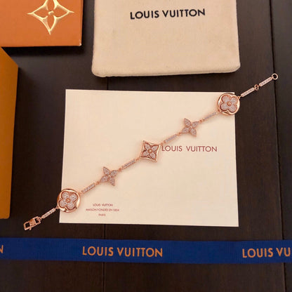260610 The new bracelet is adorned with numerous diamonds.