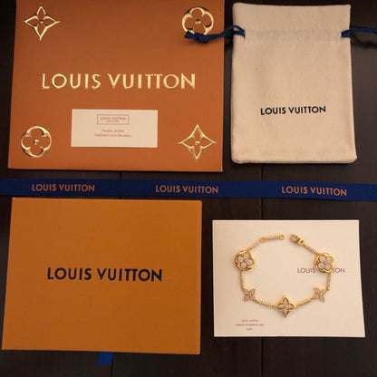 260610 The new bracelet is adorned with numerous diamonds.