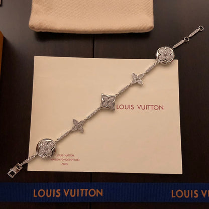 260610 The new bracelet is adorned with numerous diamonds.
